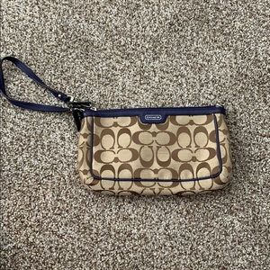 Coach wristlet with blue lining